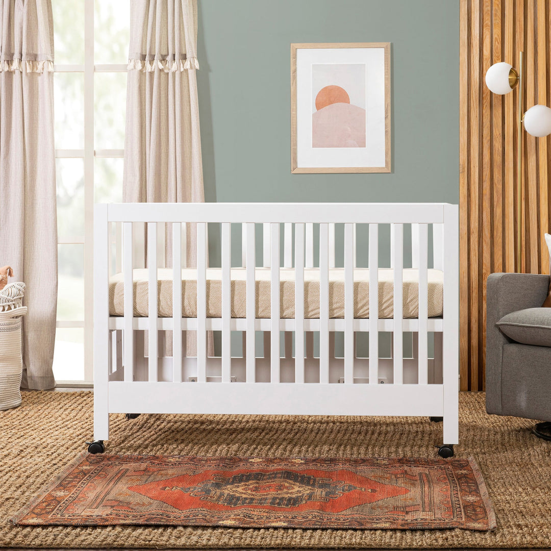 Babyletto - Maki - Full-Size Portable Folding Crib with Toddler Bed Conversion Kit - White-Leander image